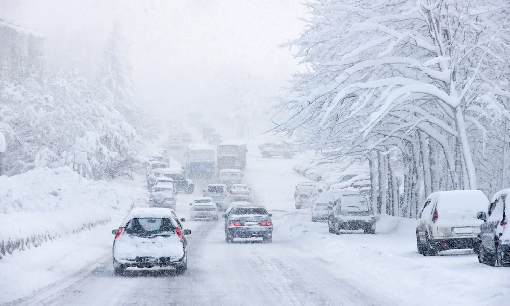 snowstorm, poor visibility,slick roads and lots of traffic